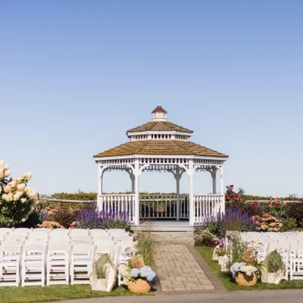 Couple sharing a kiss at the gazebo